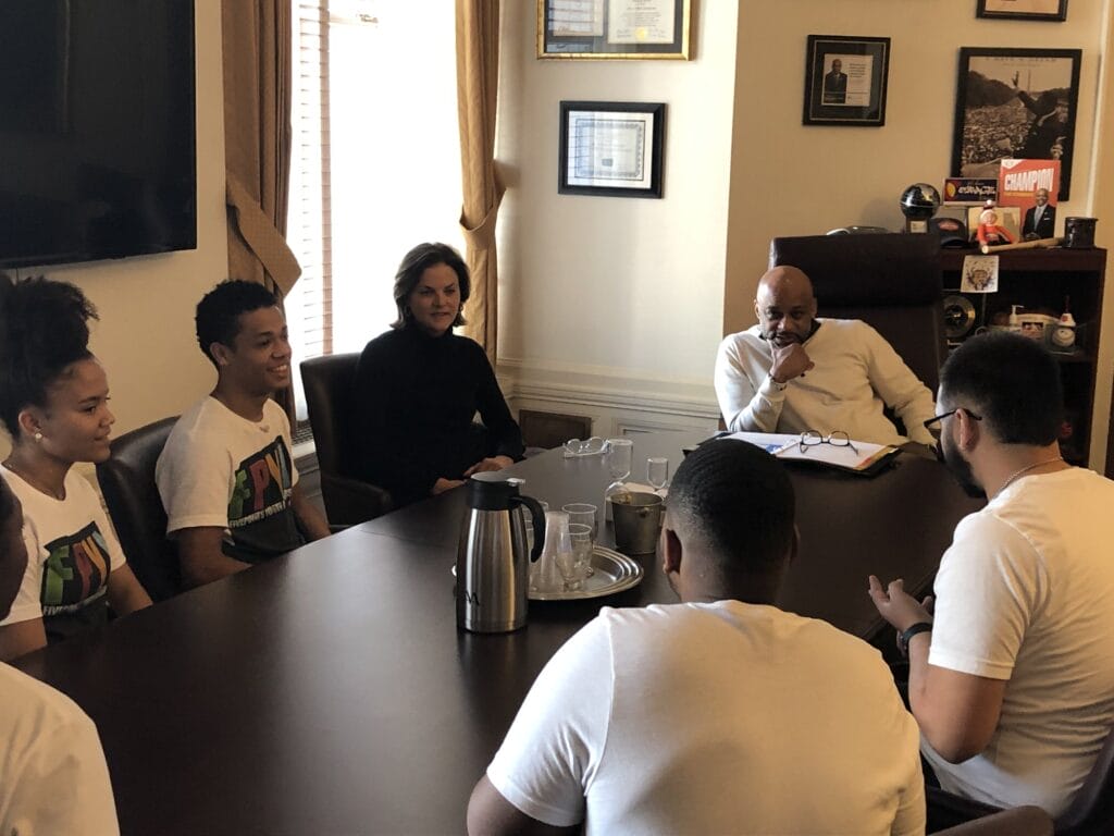 Five Points Youth Ambassadors in a meeting with Denver's Mayor Hancock.