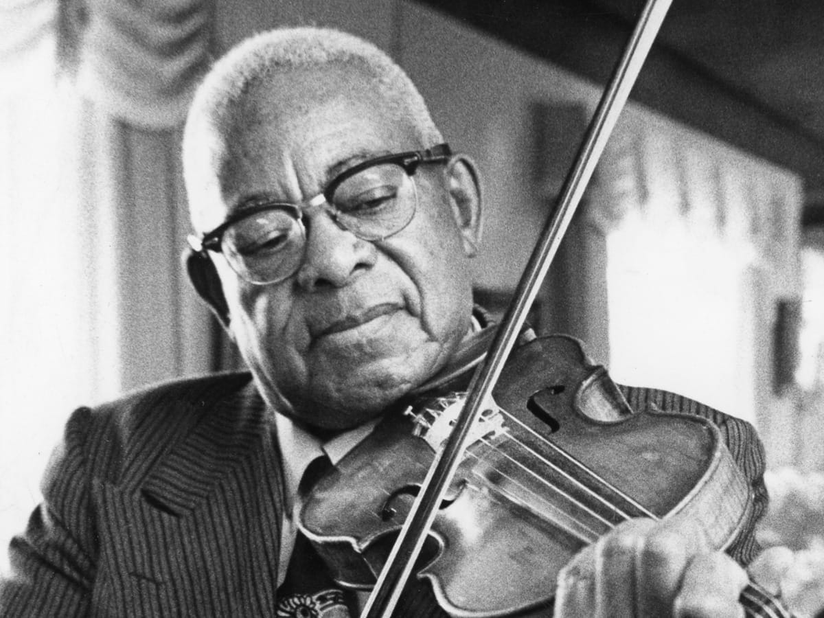 George Morrison, Sr. playing violin